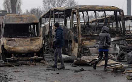 Local residents inspect damaged cars at the site of a Russian attack in Odesa. Pic/AFP